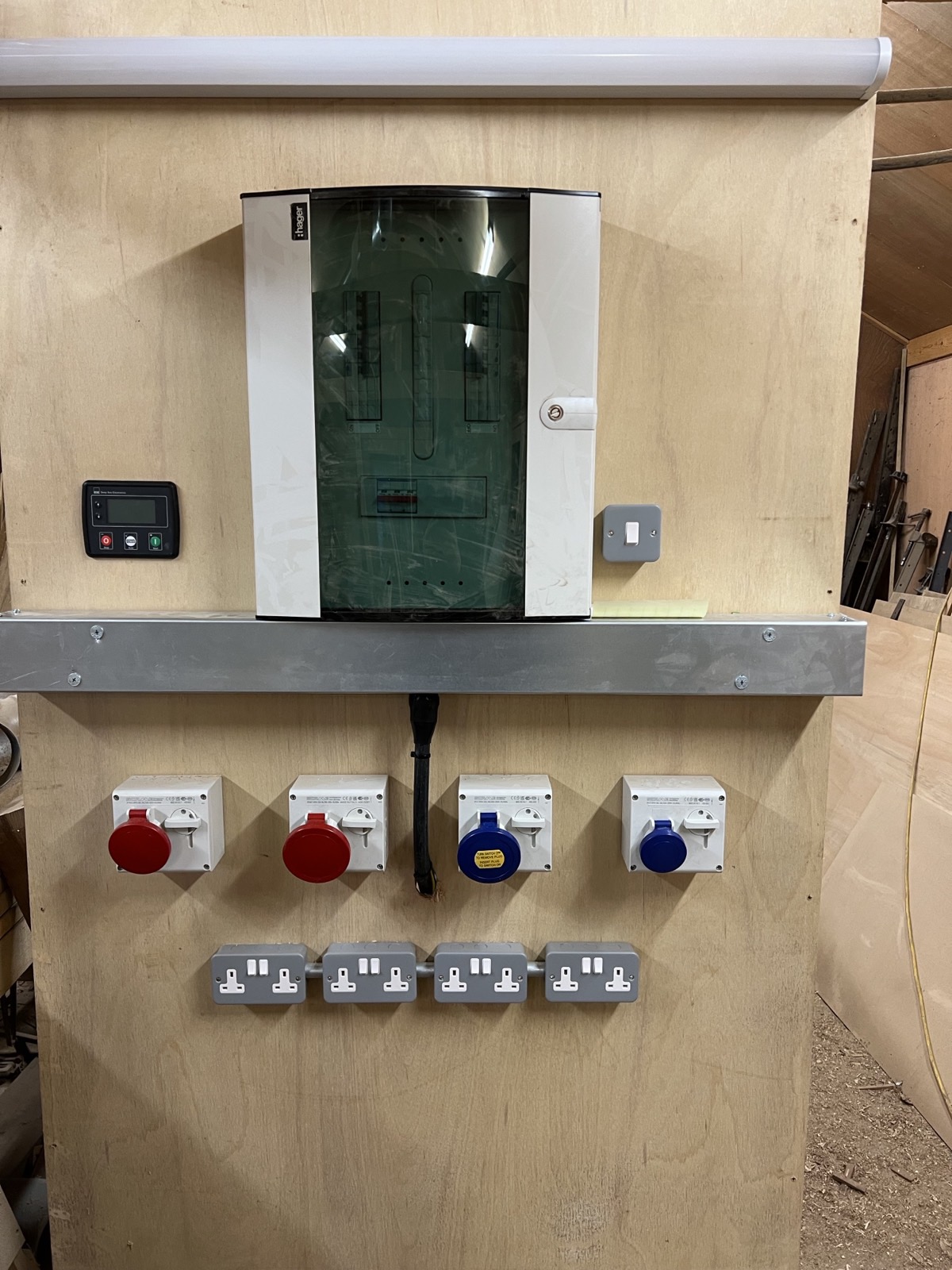 New Hager distribution board with commando sockets, fed from a recommissioned 30kVA Perkins generator at an off-grid lumber yard